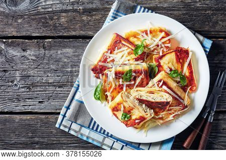 Meat Stuffed Crepes Crisped Up In Butter, Krokiety Z Miesem, Polish Cuisine, Served On A White Plate