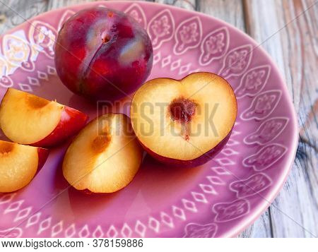 Tasty Fresh Plum Fruit On Plate For Eating
