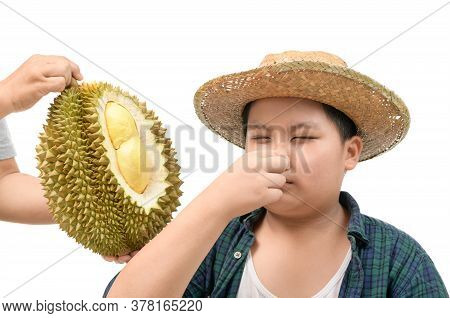Obese Fat Boy With Expression Of Disgust Against Fresh Durian Isolated On White Background, Durian F