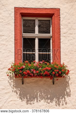 Red Framed Window At The Town Hall Of Marktredwitz