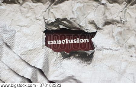 Conclusion Word Under Silver Foil Torn Paper. Education R Business Concept