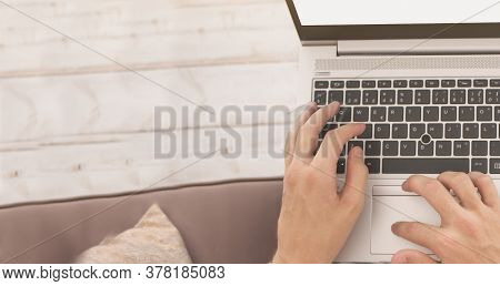 Handsome Businessman Working In His Office With Wooden Background