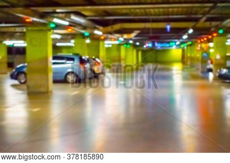Parking Lot Cars Blurred. Car Lot Parking Space In Underground City Garage. Empty Road Asphalt Backg