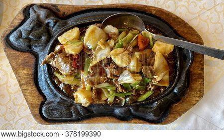 Cagne-sur-mere, France. 18.07.2020. Chinese Dishes On A Stone Dish. Tasty Food. Hight Quality Photo