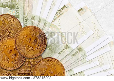 1 Chinese Yuan Bills And Golden Bitcoins. Cryptocurrency Investment Concept. Crypto Mining Or Tradin