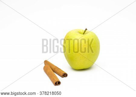 Apple And Cinnamon On A White Background