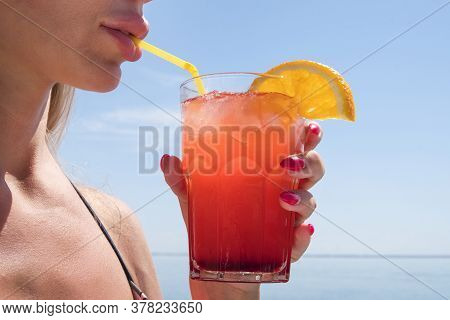 Beauty Portrait Young Woman With Glass Of Summer Cocktail Orange Juice, Organic Drink, Sea, Long Dri