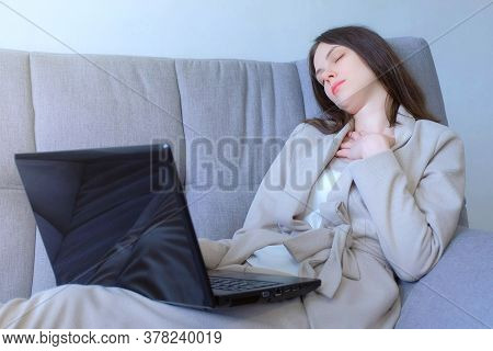 Tired Woman Sleeping Working On Laptop Sitting On Couch At Home, Distant Work. Overtime Work, Overwo