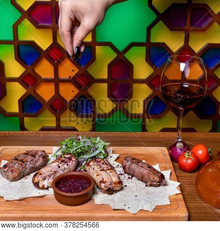 Pouring Clove To He Lyulya Kebab, Sheep Meat Meal With Red Wine