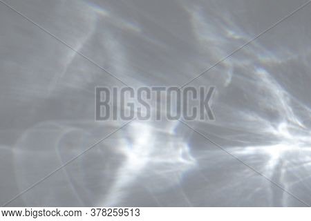 Shadow And Light Caustic Effect On A White Wall