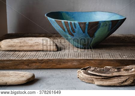 Handmade Ceramics In The Style Of Wabi Sabi. Blue Clay Bowl With An Abstract Pattern.