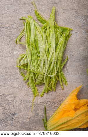 Zucchini Vegetable Noodles - Green Zoodles Or Courgette Spaghetti On Plate Over Gray Background. Cle
