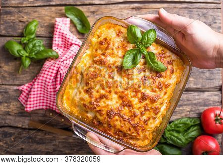 Lasagna. Traditional Italian Lasagna With Vegetables, Basil, Minced Beef Meat, Tomato And Cheese On 
