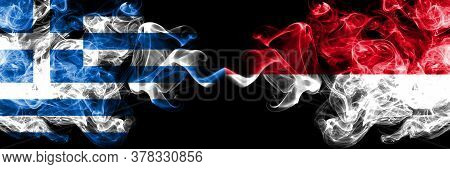 Greece Vs Monaco, Monacan Smoky Mystic Flags Placed Side By Side. Thick Colored Silky Abstract Smoke