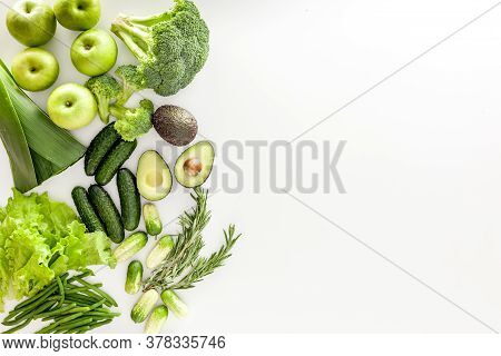 Greeny Cocktail Ingredients. Background. Сucumber, Avocado, Broccoli, Beans, Leek And Fresh Apple On