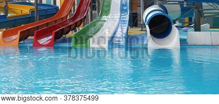 Blue pool slide swimming. Horizontal background.