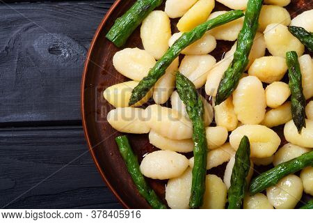 Italian Homemade Potatoes Gnocchi With Asparagus