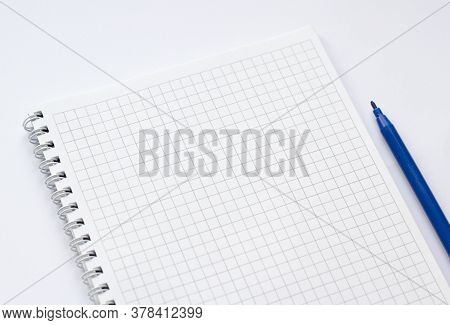 Opened Ruled Note Book With Pen And Spectacle. Selective Focus Of Notebooks, Pens, Glasses Backgroun