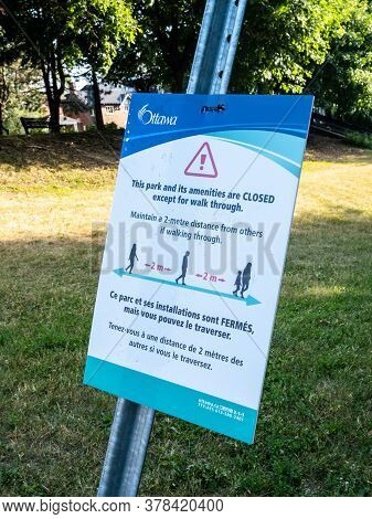 Ottawa, Ontario, Canada - July 7, 2020: A City Of Ottawa Sign At Strathcona Park Shows The Park Is C