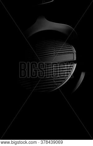 Professional Recording Studio Headphones On A Black Background. Close-up Shot