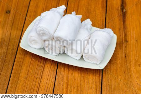 Cold Towels, Welcome In The Hotel. Wet Welcoming Refreshing Towels At The Eastern Restaurant. Welcom