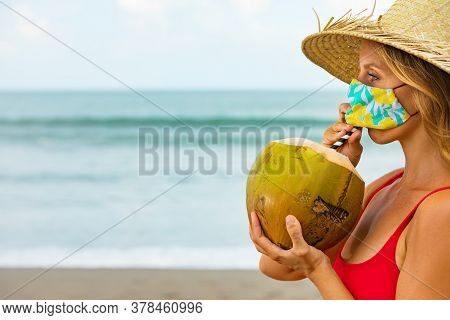 Funny Portrait Of Woman In Straw Hat Drinking Young Coconut On Tropical Sea Beach. New Rules To Wear