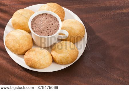 Almojabana, Traditional Colombian Food - Drink Of Chocolate. Traditional Bakery