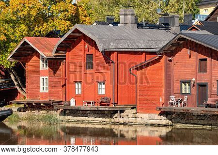 Old wooden red houses in old town of Porvoo. Autumn view of the Porvoo old town in Southern Finland.