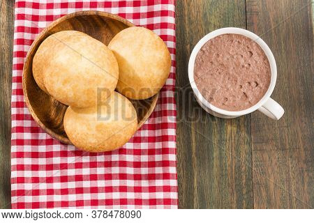 Delicious Colombian Almojabanas For Breakfast - Wooden Background