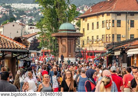Sarajevo, BiH - August 29, 2019: Bascarsija square with Sebilj wooden fountain in Old Town Sarajevo in Bosnia and Herzegovina