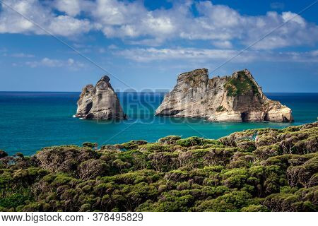 Famous Rock Formations On The Wharariki Beach In National Park. Nelson, South Island, New Zealand.