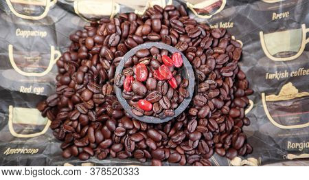 Lot Of Coffee Beans And A Small Bowl With Coffee Beans