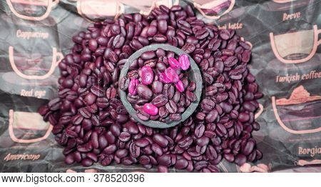 Lot Of Coffee Beans And A Small Clay Bowl With Coffee Beans