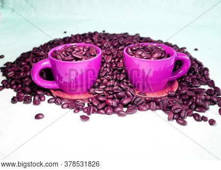 Ceramic Espresso Cups And A Lot Of Coffee Beans