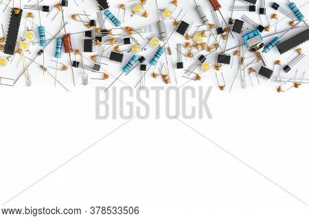 Set Of Various Electronic Components On White Background With Copy Space. Close-up, Top View