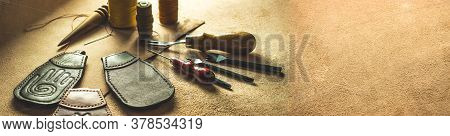 Leather Crafting And Tools For Crafting Leather Goods. Large Banner For A Site With Leather Products