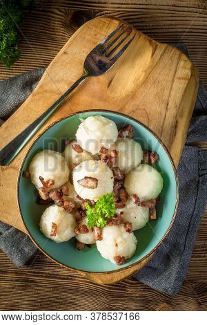 Meat Stuffed Potato Dumplings With Fried Onion And Greaves.