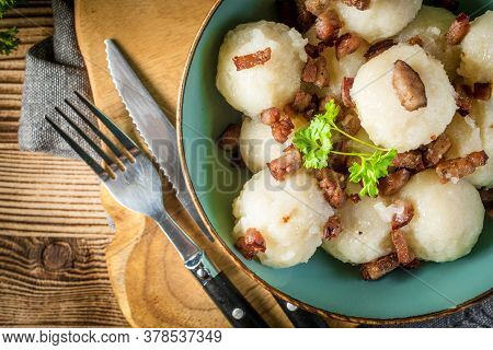 Meat Stuffed Potato Dumplings With Fried Onion And Greaves.