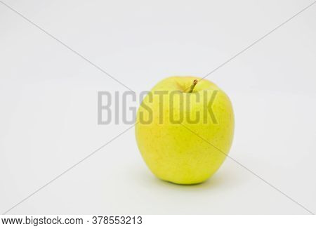 Yellow Apple Isolated On A White Background.
