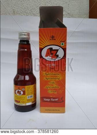 Closeup Of A To Z Ns Multi Vitamin And Mineral, Mango Flavour 200 Ml Syrup Bottle And Pack Isolated