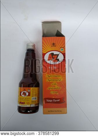Closeup Of A To Z Ns Multi Vitamin And Mineral, Mango Flavour 200 Ml Syrup Bottle And Pack Isolated