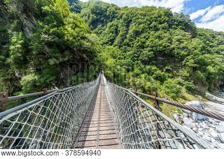 Panoramic View Over Suspension Bridge In The Taroko National Park On Taiwan In Summer