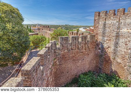View On Impressive External Wall Of Castelo De Silves In Portugal In Summer