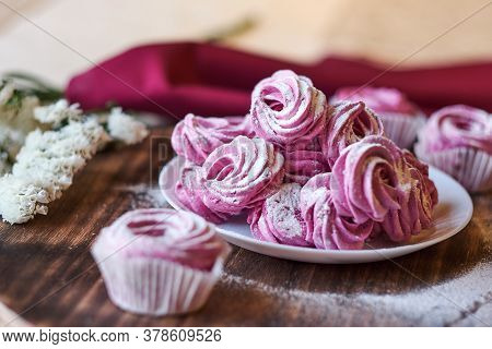 Confectioner Sprinkles Icing Sugar With Dessert. Powder Sugar Falls On Fresh Perfect Cupcakes Or Mer