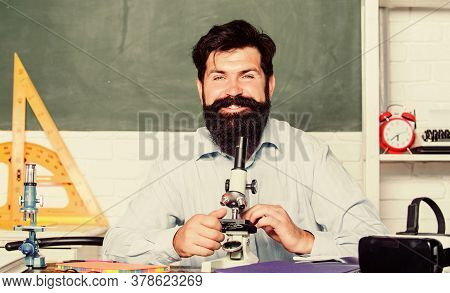 Bearded Man Teacher. Back To School. Science Experiments With Microscope In Lab. Biology Education. 