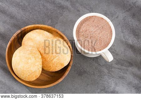 Delicious Almojabana Colombian Preparation - Wooden Background