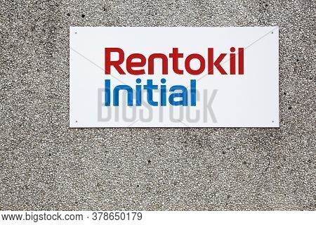 Ega, Denmark - July 25, 2020: Rentokil Initial Logo On A Wall. Rentokil Initial Is A British Busines