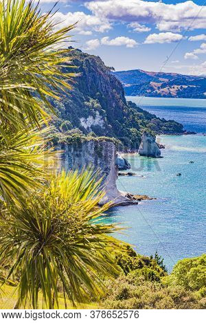 View Over Cliffy Shore Of Te Whanganui-a-hei Marine Reserve On Northern Island In New Zealand In Sum
