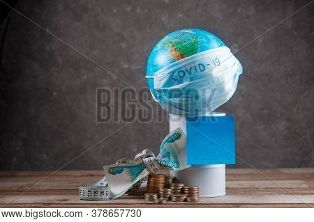 Financial Crisis Of Oil On The Planet Associated With The Epidemic. Globe With A Bandage And A Barre