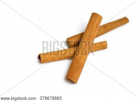 Cinnamon Sticks On A White Background. Brown, Healthy Diet.